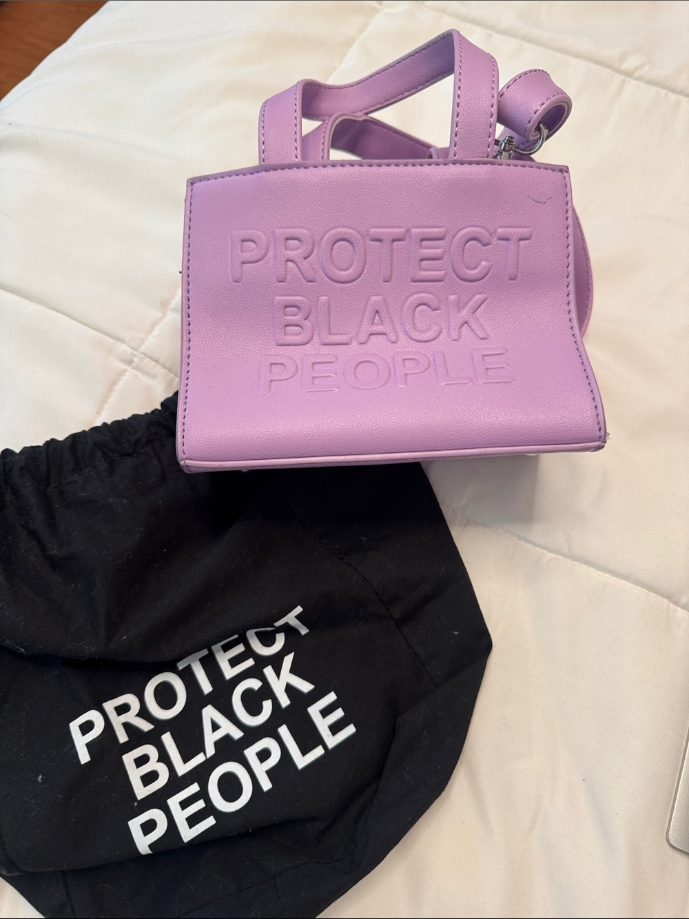 Lavender Mini Crossbody Bag with Embossed 'Protect Black People'